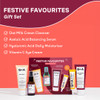 Q+A Festive Favourites Gift Set, containing a Hyaluronic Acid Moisturiser (75ml), an Oat Milk Cream Cleanser (75ml), an Azelaic Acid Serum (30ml), an