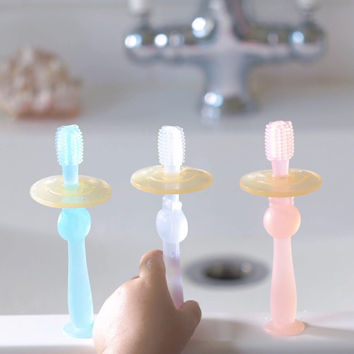 Haakaa 360 Silicone Baby Toothbrush 100 Soft Food Grade Silicone BPAFree Suction Base Safe for Babies 6 Months Gentle Gu
