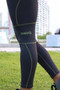 Black compression leggings with olive green stitch
