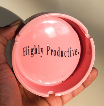 Add a pop of color to your smoking area with this vibrant 'Highly Productive' ceramic ashtray from Daily Roller. The ashtray comes in a range of vibrant colors, allowing you to express your personal style while enjoying a functional smoking accessory.