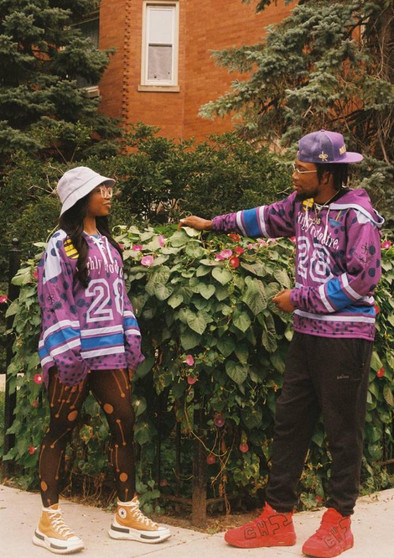 Daily Roller Highly Productive luxury purple, lavender gray, eqyptian blue hockey jersey modeled by beautiful people in Chicago Uptown neighborhood setting.