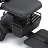 WHILL Model R 3-Wheel Scooter, close-up of the padded seat, rear storage basket and footrest