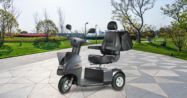 Afikim Afiscooter C3 3-Wheel Scooter, silver, lifestyle, on a plaza
