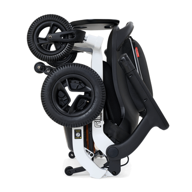 Ally Power Wheelchair in White, folded and standing upright