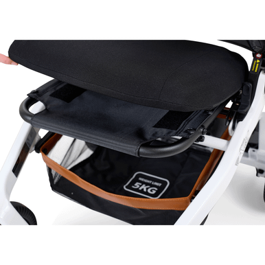 Ally Power Wheelchair, seat lifted to show under-seat storage basket