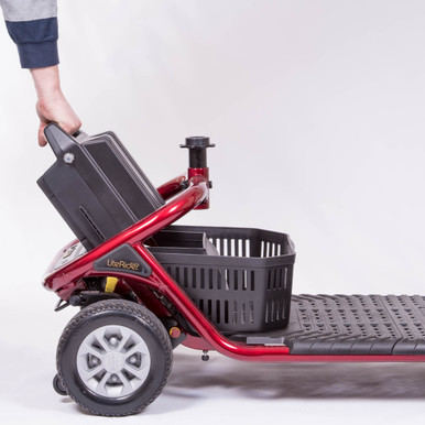 LiteRider 3-Wheel Scooter in Red, lifting out the battery pack