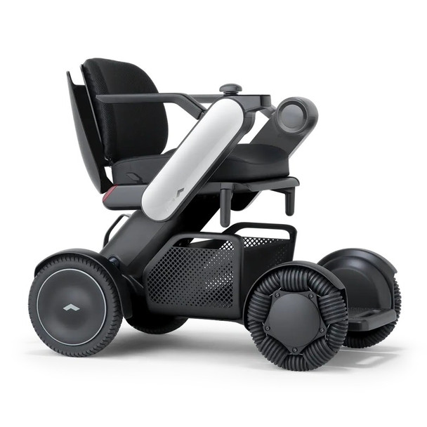 WHILL Model C2 Power Wheelchair, front three-quarter studio view