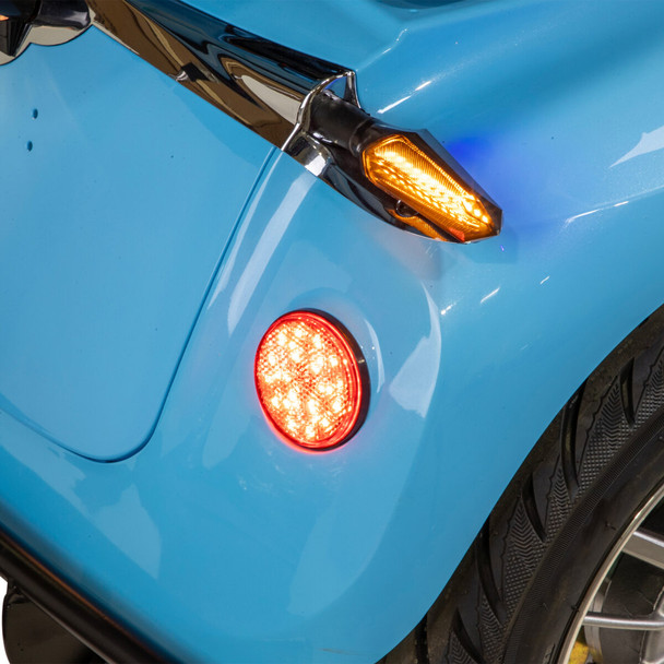 Bespoke Mobility Elite 3-Wheel Scooter, blue, close-up of turn signal and rear light