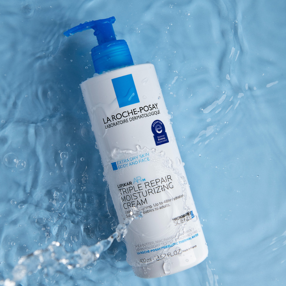 La Roche-Posay Lipikar AP+M Triple Repair Moisturizing Body Cream on water themed background