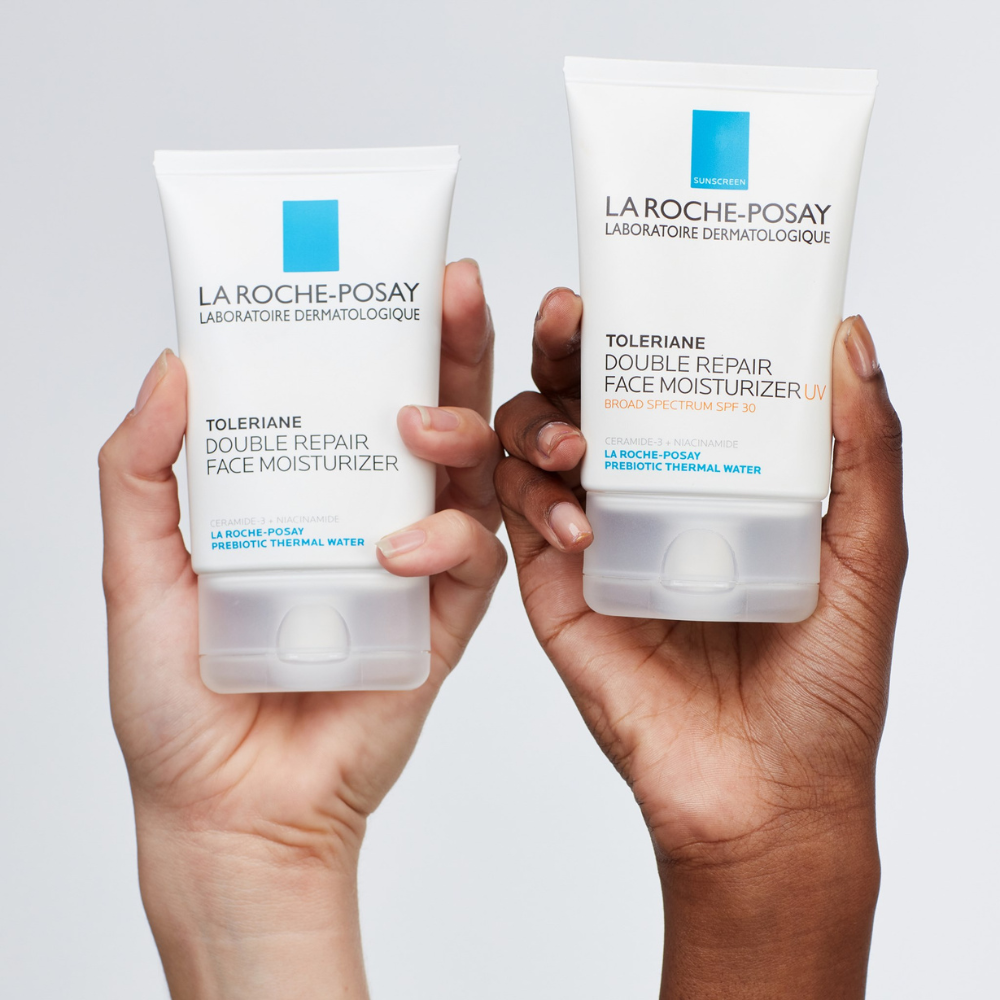 La Roche-Posay Toleriane Double Repair Face Moisturizer and Toleriance Double Repair Face Moisturizer with SPF 30 in hands