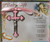 Pink enamel cloverleaf crucifix. 