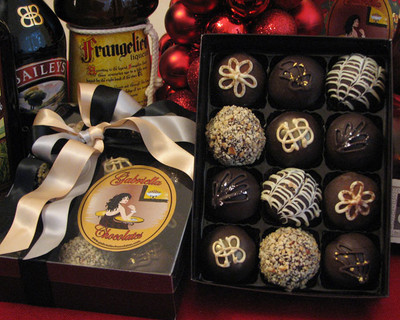 Our Spirited Dessert Truffle Collection will give you all the inspiration you need to kick off your evening right!  Imbibe on top-shelf liquors that have been generously paired with 60% Dark Chocolate, Creamy Cake Mousse flavors and sublimely complimentary centers.  No glass required; although, that would be a cute way to serve them.