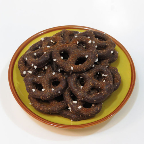 Sweet & Spicy Dark Chocolate Pretzels: 60% Dark Chocolate Covered Pretzels, sprinkled with smoky, Chipotle Pepper and sugar pearls. The Chipotle Pepper adds a little unexpected flavor to the chocolate pretzels, and is balanced by the addition of the sweet sugar pearls.