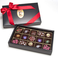 We put together these wonderful assortment and presented them in beautiful Gold box.  Each flavored center has been prepared with fresh cream & the finest quality all-natural ingredients. Encased in a shell of Premium 60% Dark Chocolate.