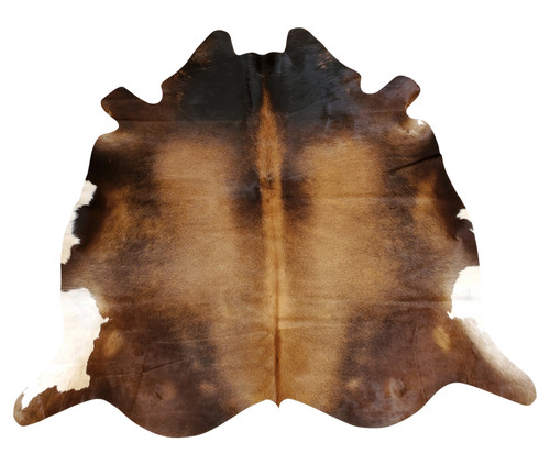 A very beautiful small cowhide rug mostly brown with white edges, amazing for high traffic living room. 