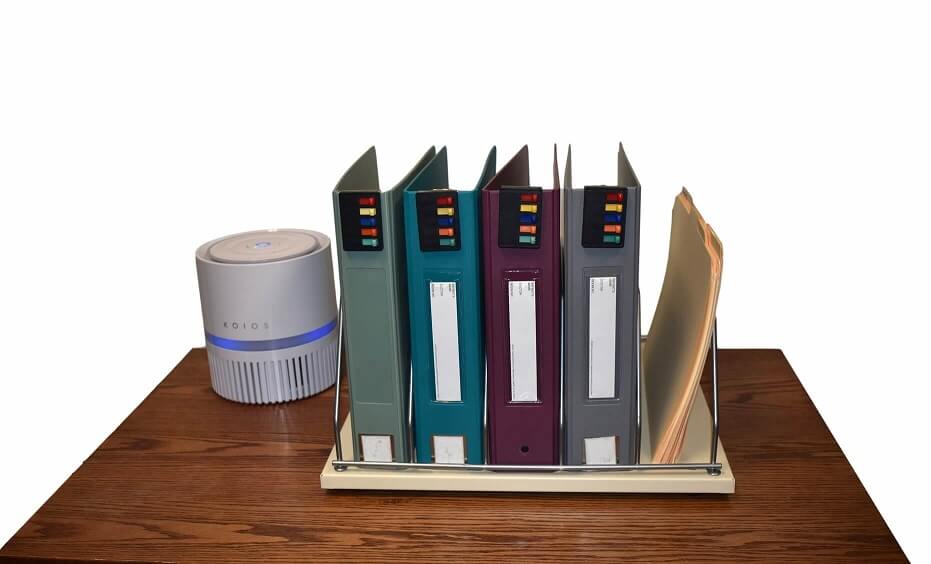 A tabletop binder storage that holds your key files Omnimed