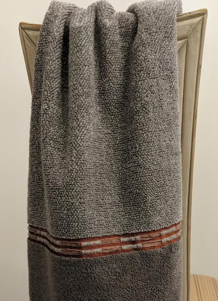 GREY TWEED HAND TOWEL WITH METALLIC RUST THREADING BORDER TO ADD A SPLASH OF COLOR