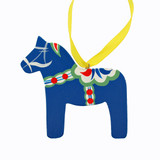 Blue wooden Dala horse Christmas ornament with hand-painted white, red, and green floral details and a yellow hanging ribbon.