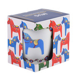 White ceramic mug with blue Dala horse design in a gift box with horse pattern.