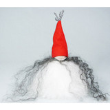 Swedish Tomtekid figure with a tall red hat and long, dark curly hair over a white furry body.