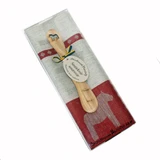 Red kitchen towel and wooden butter knife set in clear gift box, featuring Dala horse motifs and Swedish ribbon.