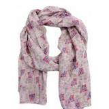 Ivory scarf with repeating Norwegian flag pattern in red, blue, and brown. Soft, draped fabric.