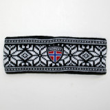 Black and white knit headband with snowflake pattern and Norway emblem.