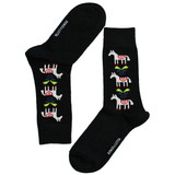 Black woolen socks with a repeating white horse pattern, red and green accents. Bengt & Lotta branding.