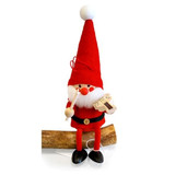 Nordic Dreams Tomte Santa figurine in red hat, holding a violin, sitting on a branch.