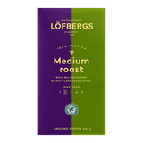 Coffee bag, purple and green, Lofbergs brand, medium roast, ground coffee, Rainforest Alliance certified.