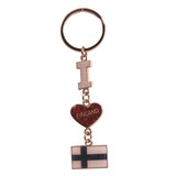 Silver-toned keychain with "I Love Finland" heart and Finnish flag charms.