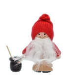 Handmade Swedish Tomte figurine with a red knitted hat, white beard, and a small black porridge pot with a spoon.
