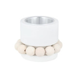 White Aarikka Prinsessa tealight candle holder with a wooden bead wreath and silver metal insert.