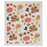 White Swedish dishcloth with a repeating pattern of Thanksgiving turkeys, pumpkins, pies, and pilgrims.