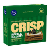 Green Fazer Rye & Rosemary crispbread box, with a stack of crisps topped with cream, blackberries, and rosemary.