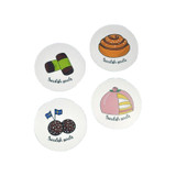 Four round coasters with Swedish sweets illustrations: cinnamon roll, cake, chocolate balls with flags, and green-wrapped