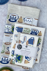 Anneko Design Blue Fika dishcloth and linen towel set. Beige linen towel and dishcloth with blue and brown coffee cup