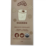 Eggnog chocolate bar with snowflakes; tan background; white chocolate; Sted brand.