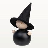 Wooden Easter witch figurine with black hat, body, and arms.