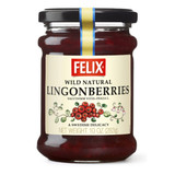 Jar of Felix Lingonberries, red fruit, cream label, black lid, Swedish delicacy.