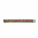 Swedish woven braid bracelet in burgundy, white, and green, featuring an intricate Nordic pattern and silver button.