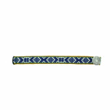 Navy and white woven bracelet with a Nordic-style button closure.
