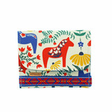 White fabric wallet with red and blue Dalahorse motifs, fold-over flap, and a woven patterned border.