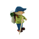Wooden and felt hiker boy ornament wearing blue cap, green shirt, carrying a backpack and walking stick.