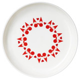 White ceramic plate decorated with a circular pattern of red Tonttu elves and hearts.