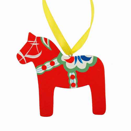 Red wooden Dala horse ornament with white, green, blue, and red handpainted details, hung by a yellow ribbon.