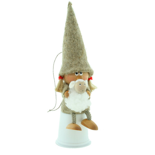A wooden felt gnome sitter with tall grey hat holding a white lamb.