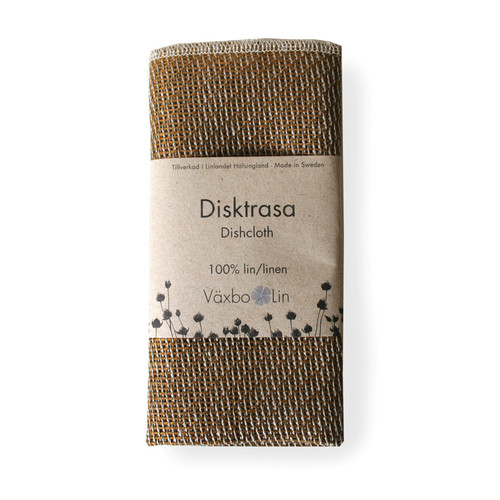 Folded brown linen dishcloth wrapped in a paper band labeled "Växbo Lin".
