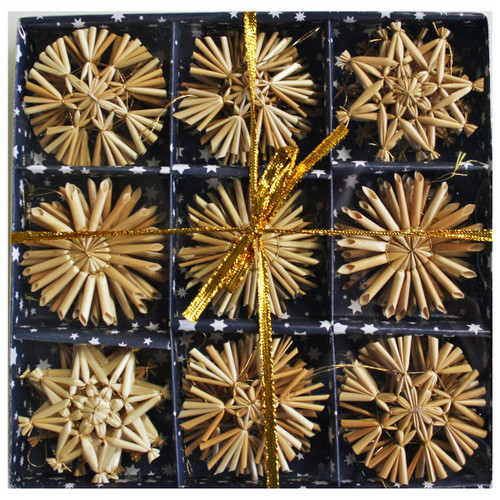 Straw ornament assortment in a box, gold ribbon, natural wheat straw, star and snowflake shapes.