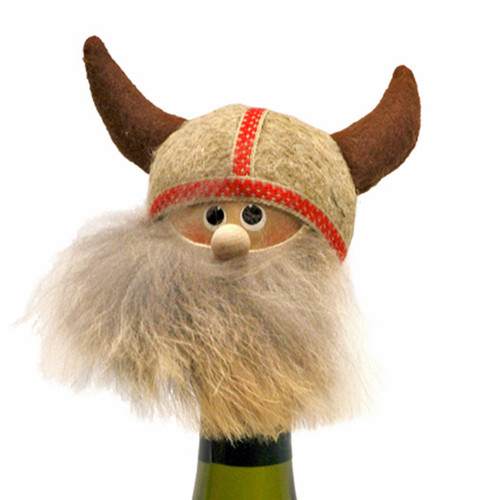 Handmade Viking bottle topper with a horned felt helmet, wooden face, and full fur beard on a green bottle.
